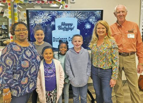 MEMBERS OF THE BURLESON County Historical Commission and “Texicurean” Cindy Williams visited Caldwell Elementary School last week during the county’s annual Heritage Week.