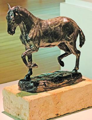 PIAFFE, A BRONZE, sculpture by Clover Cochran is on display at the MSC at Texas A&amp;M University in the “Practice What We Teach” art exhibit in the Reynolds Gallery.