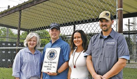 CALDWELL MAYOR JANICE Easter joins Donny Feil of Non-Ferrous, Karly McCarthy and Nick Harris in front of the dugout.