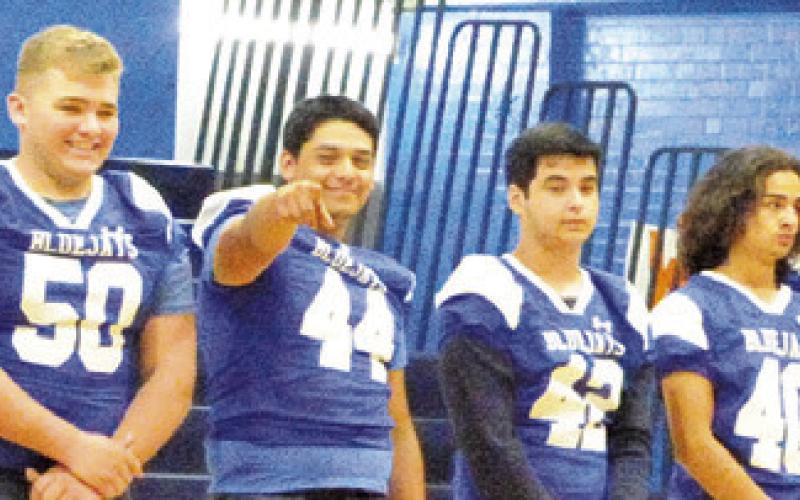THE SNOOK BLUEJAY FOOTBALL team is recognized during last Thursday’s “Meet the Bluejays.” -- Tribune photo by Denise Squier