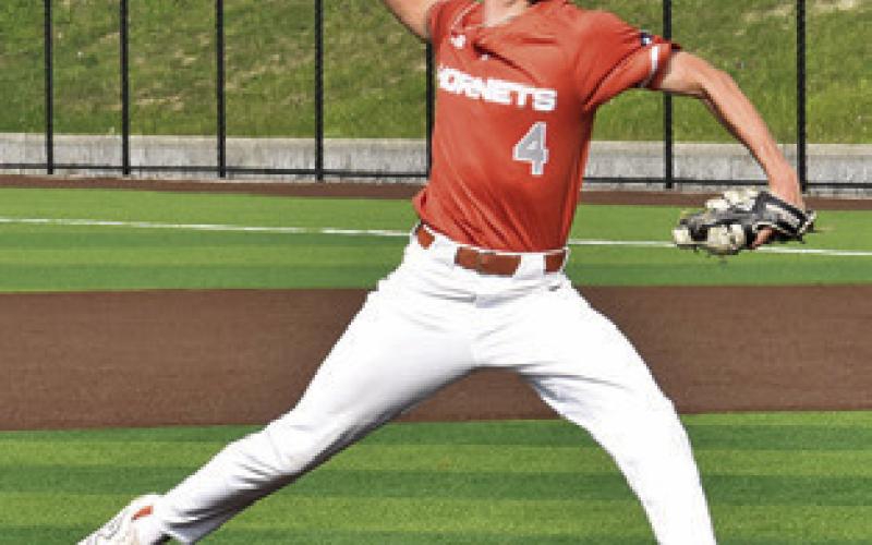 CALDWELL’S COLBY Maresh hurls this pitch against La Grange last Friday. Tribune photo by Roy Sanders