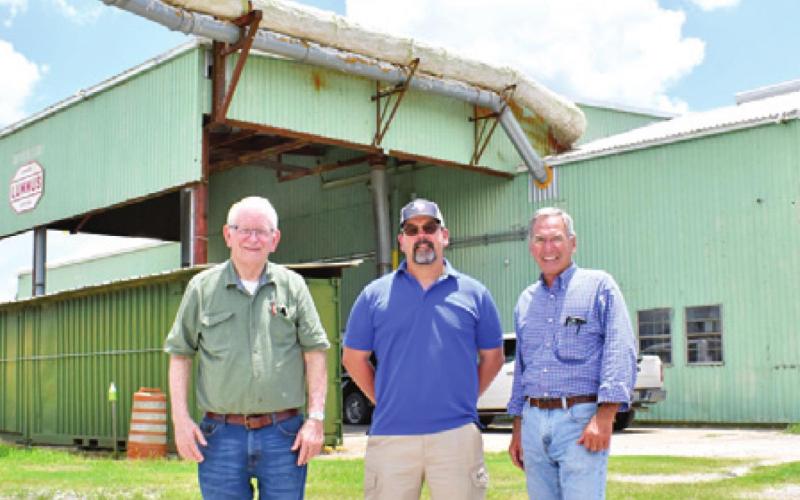 LEIGHTON STOVALL, CENTER, is joined by Paul Silas, left, and Vince Patranella, right. -- Tribune photo by Roy Sanders