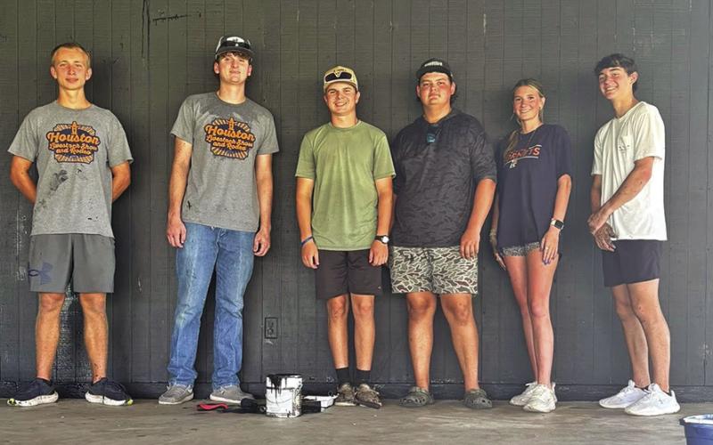 MEMBERS OF THE BURLESON County Junior Fair Board repainted the stage ahead of this year’s fair as one of the group’s first official acts. Photo courtesy of Burleson County Junior Fair Board