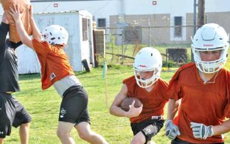 THE CALDWELL HORNETS FOOTBALL team works on these drills on Monday morning, Aug. 5, on the first day of fall workouts for the 2019 season. The Hornets are getting ready for the Aug. 30 opener with Edna. -- Tribune photo by Roy Sanders