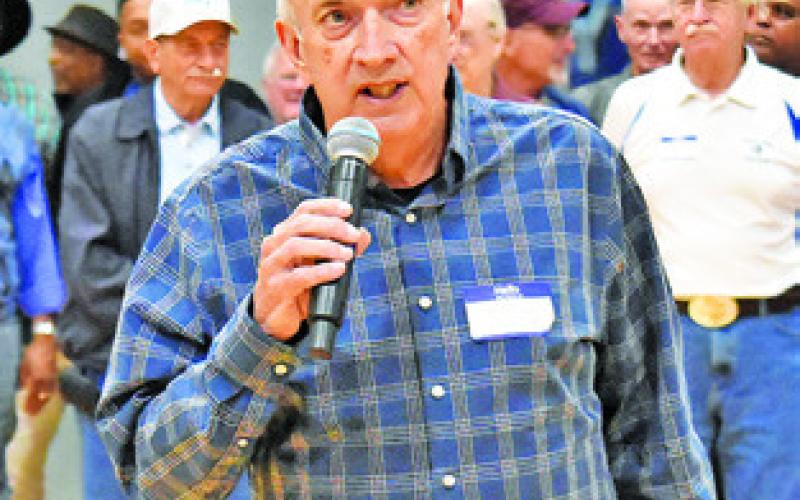 FORMER SNOOK COACH Don Horn addresses the crowd at the Friday game.