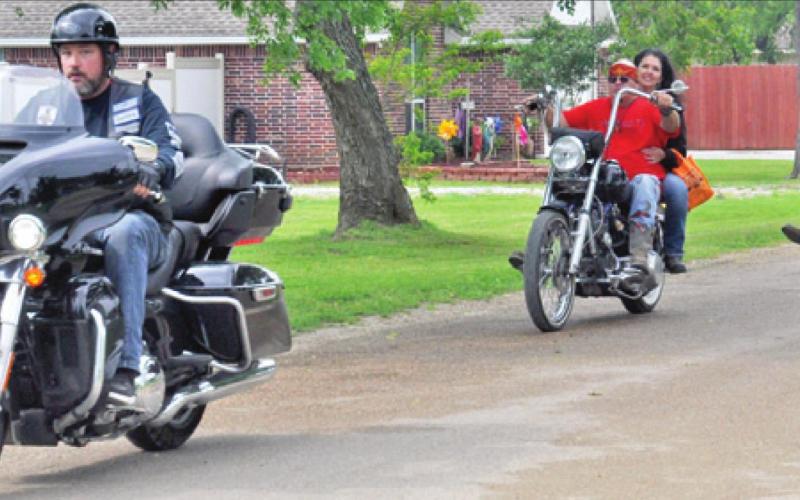 BIKERS PARTICIPATE IN THE parade through downtown Somerville at the 2019 Carts, Bikers &amp;amp; Babes motorcycle rally . This year’s rally was recently canceled.