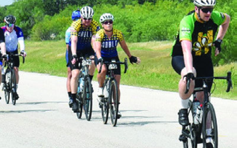 BIKERS RIDE DOWN Thornberry Street in Somerville on Sunday, April 27, as part of the MS-150 ride. The event raises funds for Multiple Sclerosis research, drawing bikers from the Austin and Houston areas, concluding at Kyle Field at Texas A&amp;amp;M University in College Station.