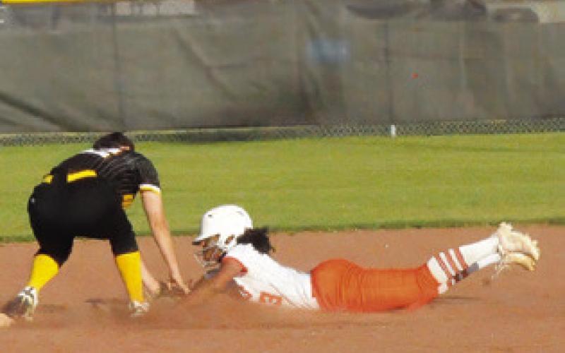 SOMERVILLE’S EMMA WILLIAMS IS called out sliding into second base during the Lady Yeguas’ win over North Zulch last Friday in Somerville. Tribune photo by Denise Squier