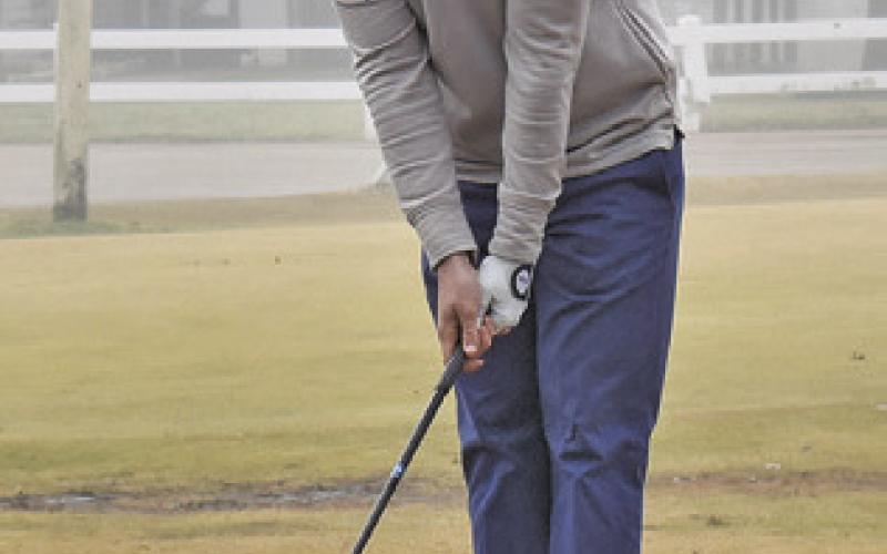 KADEN FRITSCHE prepares to tee off at the Lexington Tournament.