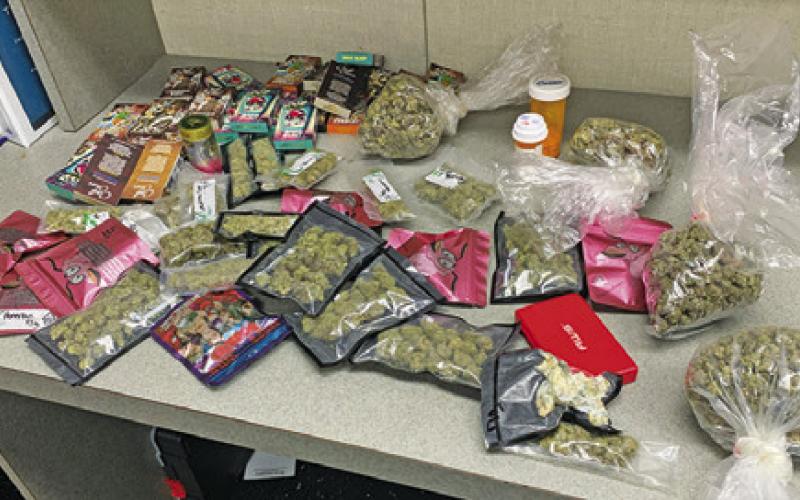 THESE DRUGS WERE confiscated by law officers from the pursuit and arrests on Jan. 25. Two persons were apprehended and charged.