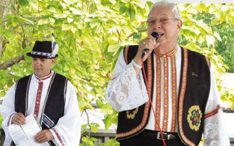 ZACH ZGABAY AND JOE RYCHLIK act as masters of ceremonies during the opening ceremonies of this year’s Kolache Festival. Tribune photo by Denise Squier