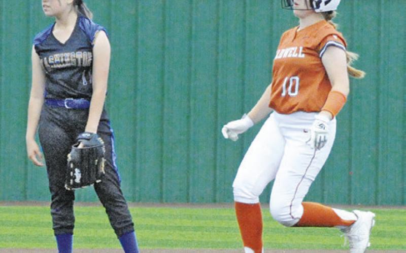 CALDWELL’S KELLY URBANOVSKY runs safely to second base during the Lady Hornet’s 15-0 win over Houston Washington last Friday.