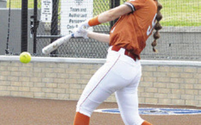 TRISTA DUSTERHOFT hits the ball during the Caldwell-Washington bidistrict game last Friday.