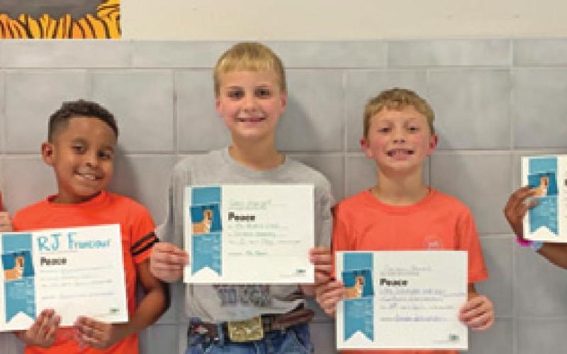 SIX THIRD-GRADE students at Caldwell Elementary School were recognized with Person of Value for Peace certificates. Pictured from left are, Dallas Ortega, RJ Franciour, Cash Albright, Carson Ferrell, and Amari Washington. Not pictured, Anazia Roberson.