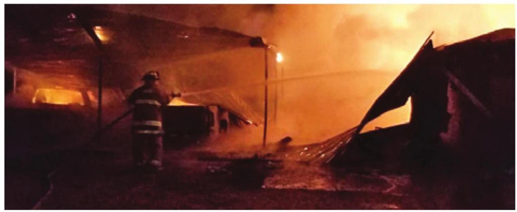 FIREFIGHTERS FROM SNOOK and Beaver Creek battled this blaze late Sunday, Jan. 26, at the Slovacek home off County Road 265 in Snook. The home, a carport and two vehicles suffered damage.