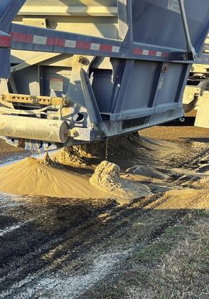 SAND IS LEAKED onto the roadway as this driver is stopped by a sheriff’s deputy. Photo courtesy of Burleson County SO