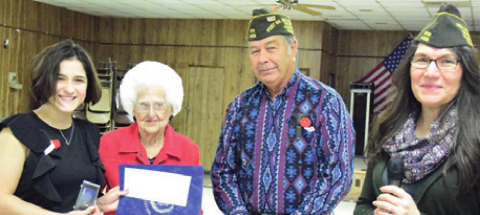 SABINE LAZO, LEFT, won the VFW’s annual Voice of Democracy speech contest. She is pictured with LaNette Boyd with the VFW Post No. 4458 Auxiliary, Tommy Miles and Tina Smith from the Caldwell VFW Post No. 4458. -- Tribune photo by Denise Hornaday