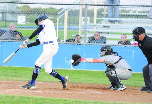 SNOOK’S J. BEAUX Hruska takes a swing as Somerville catcher Chance Esparza makes the catch in game two of their double header. -- Tribune photo by Denise Squier