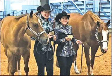 CALDWELL’S SABINE LAZO won several Senior division championships at the 2019 State 4-H Horse Show. She and her horse, The Ultimate Attitude, also were named the champion Senior Hunter Flat Horseman. She is picured with Claire Beesaw and her horse, Plain N Simple. Beesaw was named as the Champion Judged Horseman.