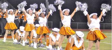THE CALDWELL HIGH SCHOOL Honeybees perform at halftime of the Caldwell-Edna football game last Friday, Aug. 30, at Hornet Stadium. The Honeybees will perform again this Friday at halftime of the Rockdale game. --Tribune photo by Roy Sanders