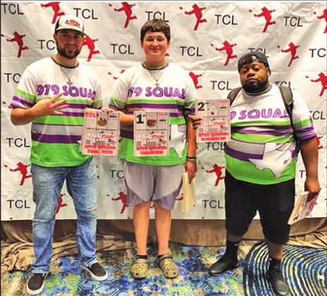 JOSH GROCE AND A.J. SIMS of Caldwell won their third consecutive Texas Cornhole League (TCL) State Championship in the Open Doubles division. They are pictured with 14-year-old Kaleb Batson -- the youngest contestant to ever win the open division of the TCL.