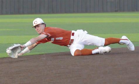 RYAN SEE OF Caldwell lunges for the ball against Taylor. The Hornets won 4-3. -- Tribune photo by Denise Squier