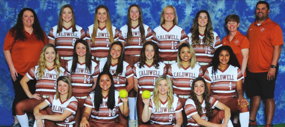 THE 2020 CALDWELL LADY HORNET VARSITY SOFTBALL TEAM is, from left, back, Assistant Coach Alysia Escalante, Bailey Long, Hailey Vess, Tess Homeyer, Paige Odenbach, Caylee Garza, Head Coach Wendy Weiss, Assistant Coach Marcus Escalante, middle, Michaela Jaster, Jacey Vykukal, Harlee Taylor, Kyleigh Gomez, Mercede Rodriguez, Aliyah Vela, front, Emerson Faust, Haile Garcia, Grace Fritcher and Alayna Hart. -- Photo courtesy of Dianne Pursch Photography