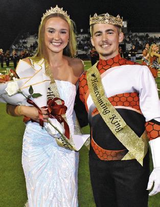 CALDWELL HIGH School Homecoming Queen Lucy Ferguson and King Grant Leubner are crowned on Friday at the game.