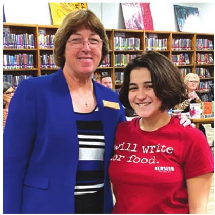 CALDWELL&#x2019;S SABINE Lazo was recognized as a &#x201c;commended student&#x201d; in the 2020 National Merit Scholarship Program. She is pictured with Caldwell High School principal Vicki Ochs after being honored for her achievement at Monday night&#x2019;s school board meeting.