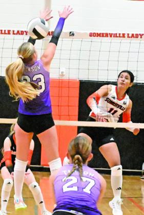 ANETTE REYNA gets a kill during Somerville’s match against Aggieland HomeSchool last Friday in Somerville. Tribune photo by Denise Squier