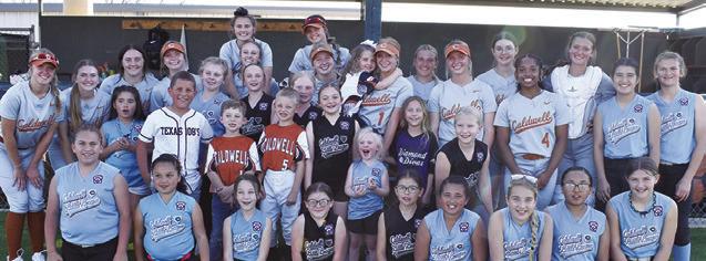 CURRENT AND FUTURE Lady Hornets and Hornets are pictured during Little League Night last Thursday at Lady Hornet Field for the Caldwell-Manor New Tech game.
