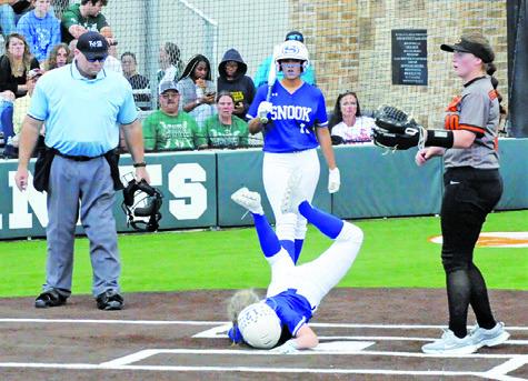 SNOOK’S KYLIE PRICE slides head first safely into home during the Lady Jays’ bi-district win over Centerville last Friday night at Lady Hornet Field in Caldwell. -- Tribune photo by Denise Squier