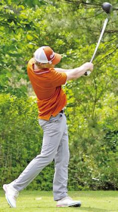 HARRISON NOVAK hits a tee shot at the regional golf tournament in Huntsville.