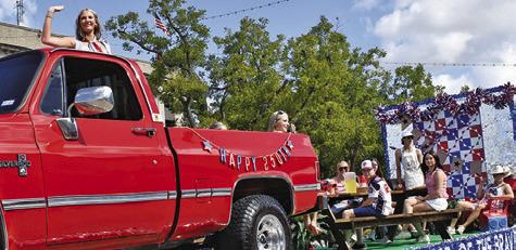 JOLEE TELSCHOW, BURLESON County Fair Queen, rides in her float on Saturday morning at the Burleson County Fair Parade. Tribune photo by Roy Sanders