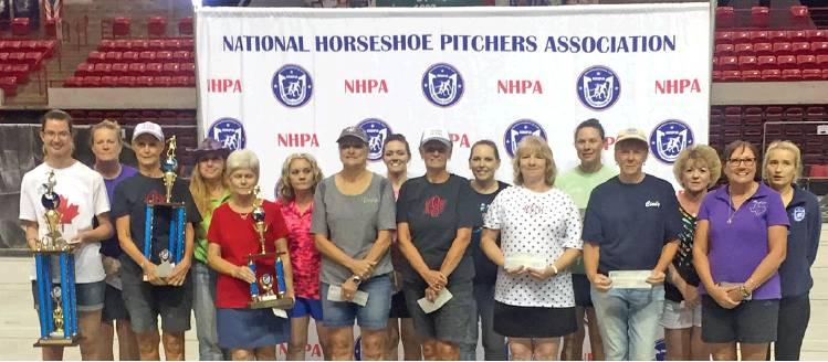 DORIS HIEDEN OF CALDWELL, seventh from the left, placed fourth in the world competition of the National Horseshoe Pitchers Association annual tournament in Wichita Falls. She is also a multiple Texas state champion and will compete again this fall for that title.