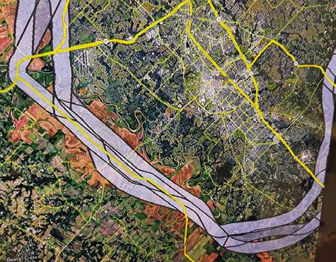THE PORTION OF I-214 Loop is shown running from State Highway 21 East at the F.M. 50 intersection, top left, crossing F.M. 60 East, middle of the graphic and veering southward and then back east.