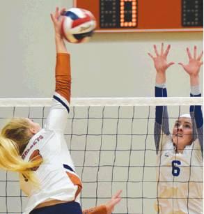 SNOOK’S JAYCIE BRISCO ATTEMPTS to block a hit from Caldwell’s Marley Maurer on Friday. The Lady Hornets swept the Lady Jays in three sets. -- Tribune photo by Denise Hornaday