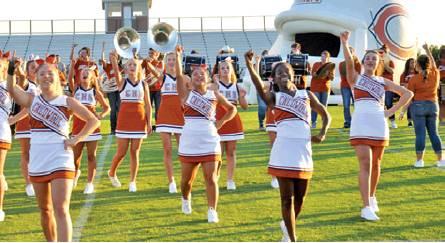THE CALDWELL HIGH School cheerleaders lead these cheers on Monday night, Aug. 12, at the Meet the Hornets celebration at Hornet Stadium. -- Tribune photo by Roy Sanders