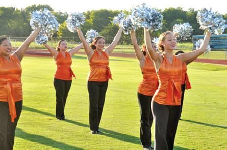 THE CALDWELL HONEYBEES drill team performs for a large crowd on Monday night, Aug. 12, at Meet the Hornets at Hornet Stadium. Athletes and band members also participated.
