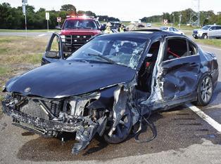 THIS BMW DRIVEN by Aiken Taylor Morgan was damaged on Thursday, Oct. 8, in a collision at F.M. 60 at F.M. 3058. Tribune photo by Roy Sanders