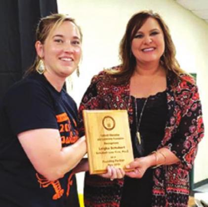 MARSHA KOCUREK, president of the Caldwell Education and Leadership Foundation, is pictured presenting a sponsorship award during CELF’s annual crawfish boil last spring. Kocurek was selected to be a presenter during the National School Foundation Association’s national conference in Philadelphila.