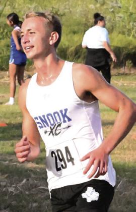 SNOOK’S BARRETT Dudensing won the varsity boys race at Saturday’s Yegua Invitational cross country meet at Overlook Park. Tribune photo by Denise Squier