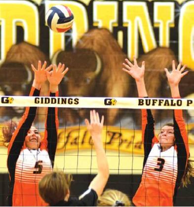 MADDIE COOPER and Emma Kovasovic reach to attempt to block a hit from Giddings’ Kassidy Beisert during the Lady Buffs win over the Lady Yeguas on Tuesday. -- Tribune photo by Denise Hornaday