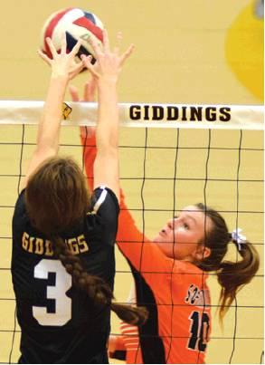 SOMERVILLE’S GABBY Kovasovic and Giddings’ Kassidy Beisert battle at the net for the ball during the Lady Yeguas’ loss on Tuesday.