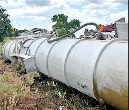 THIS OIL TANKER overturned on Wednesday, Aug. 14, off F.M. 975 about two miles south of Caldwell. Oil was spilled into a nearby ditch, and a hazmat cleanup crew from Hockley responded.