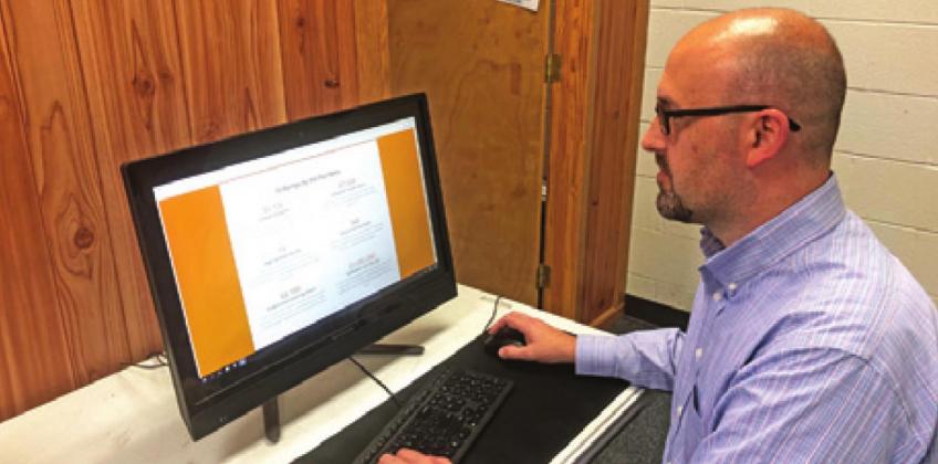 SNOOK ISD’S DIRECTOR OF CURRICULUM Jerod Neff looks at the University of Texas’ OnRamps website. The dual enrollment program will allow students of Burleson County the opportunity to earn college credit in a low risk and low price option.