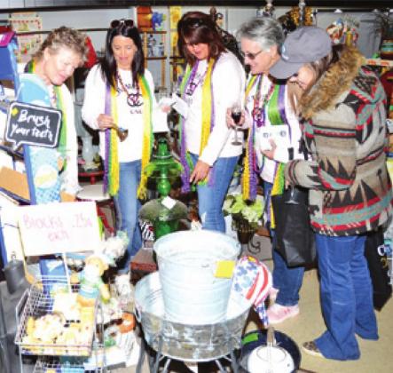CINDY HAAS, LAURIE Loya, Rhonda Spies, B.J. Hegemeyer and Jessica Juvinall visit Backporch Antiques on Saturday during Chocolate, Champagne &amp; Cake Walk in downtown Caldwell.