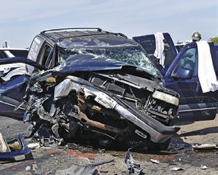 THIS VEHICLE was destroyed on Friday afternoon, Sept. 25, in an accident on State Highway 21 West. No information on the crash was available at press time. Tribune photo by Roy Sanders