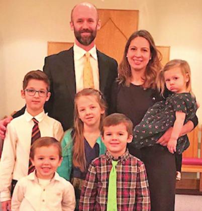 PASTOR ANDREW KEUER and his family
