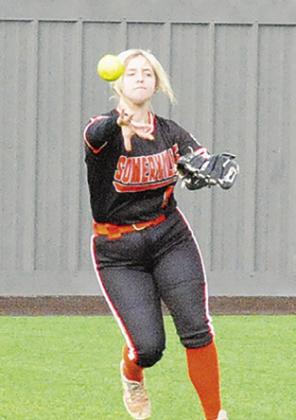 JALYNN URBANOSKY throws the ball from the outfield during the Somerville-Giddings tournament game last Thursday in Thrall.